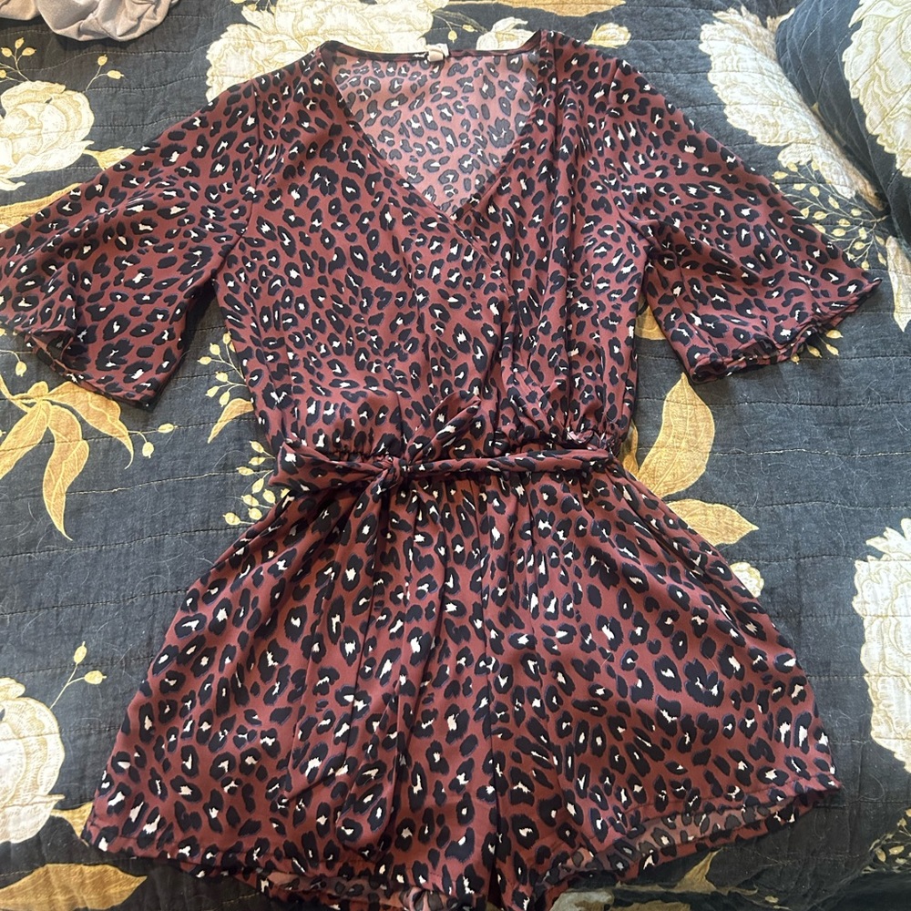 Cheetah print romper with pockets